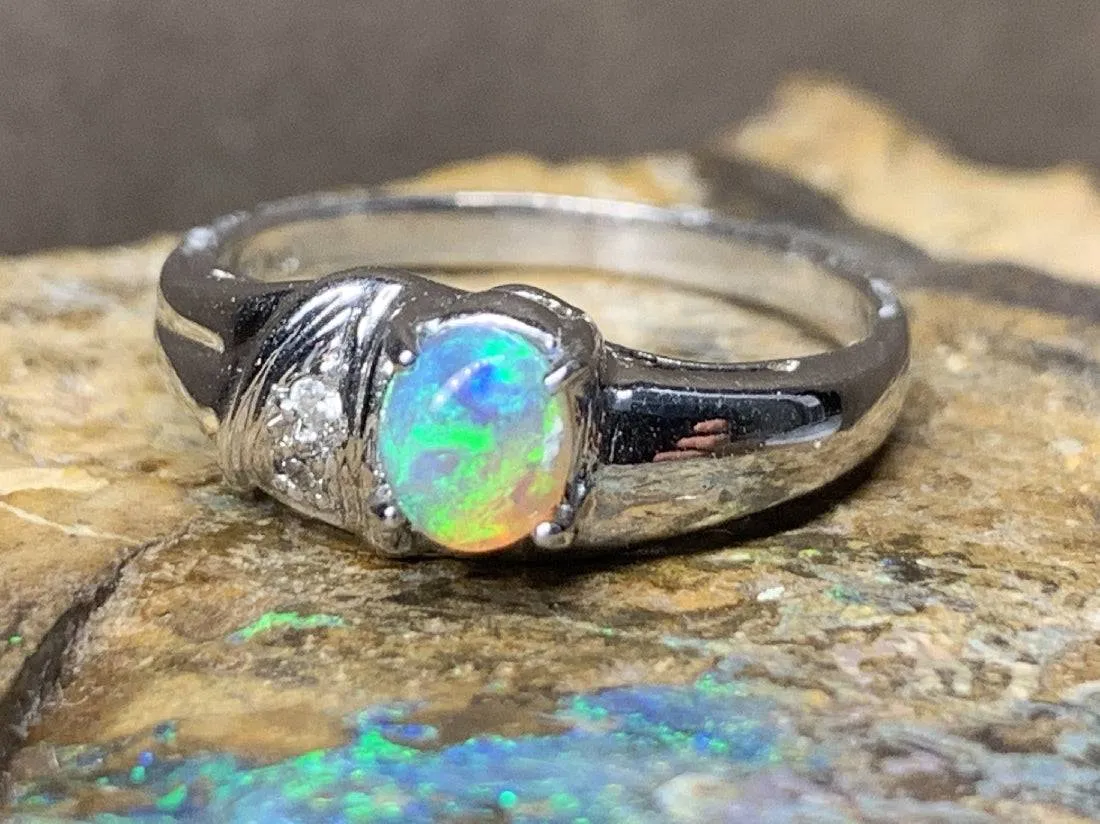 18kt White Gold Black Crystal Opal and Diamond ring