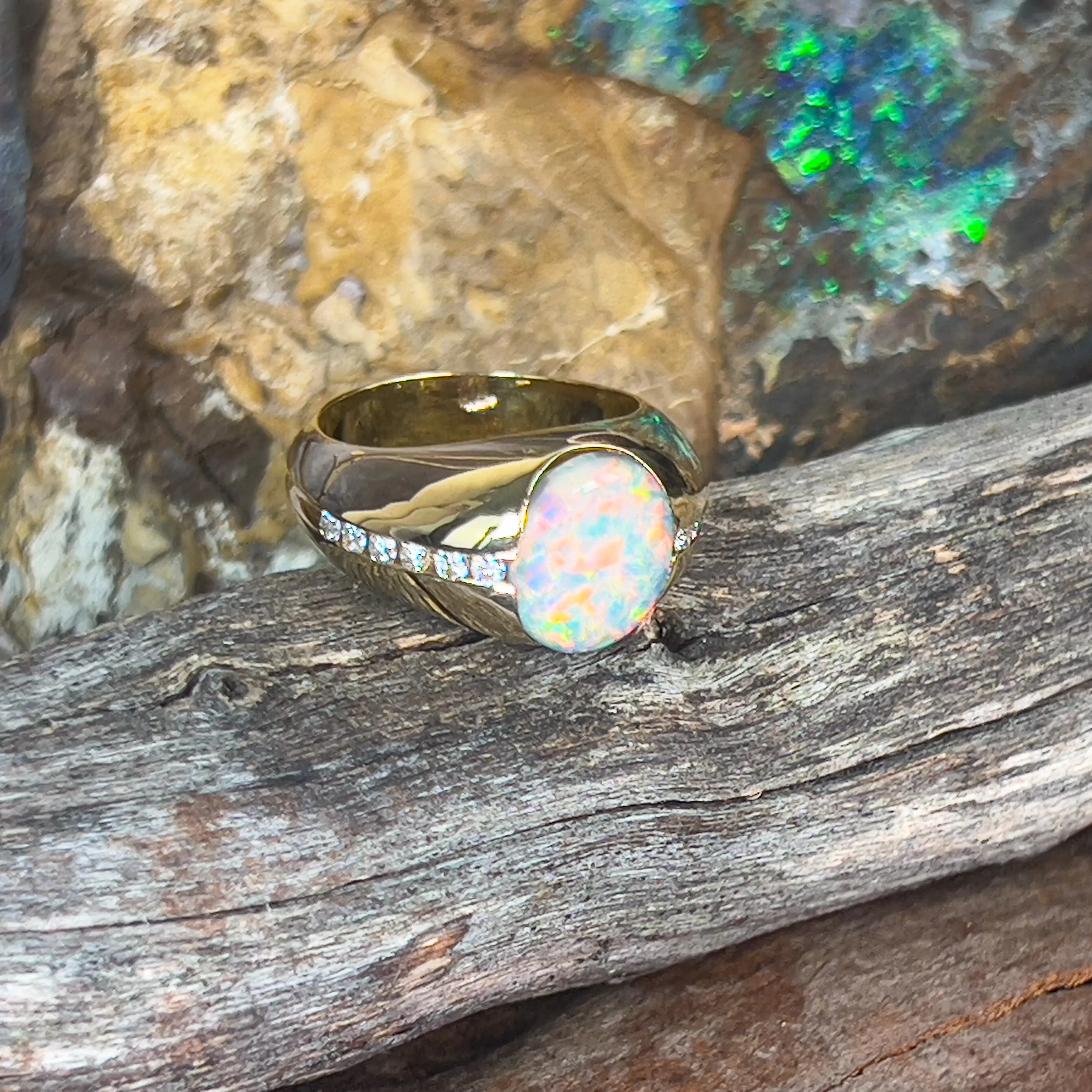 18kt Yellow Gold Black Opal 3.06ct signet style rub ring with diamonds