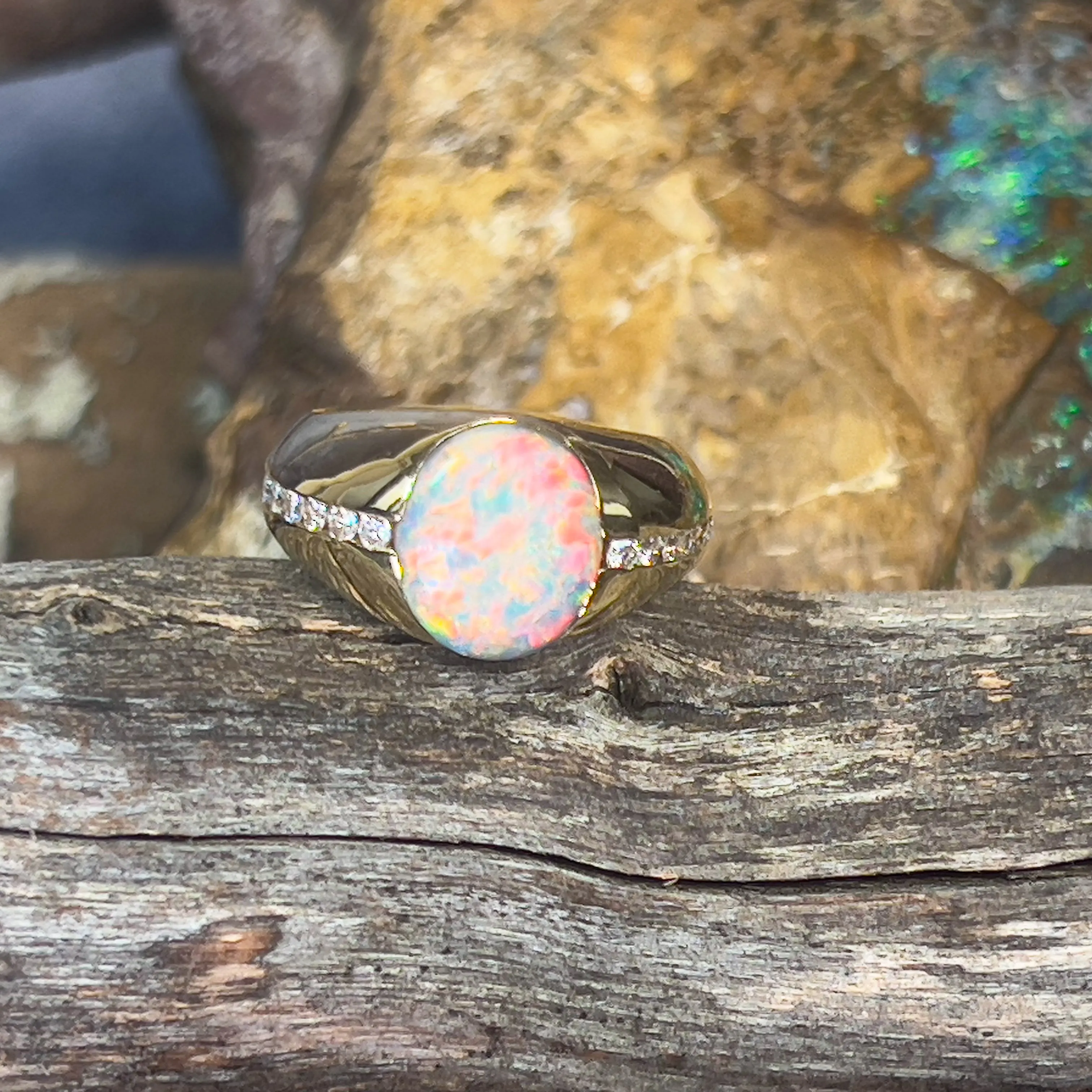 18kt Yellow Gold Black Opal 3.06ct signet style rub ring with diamonds