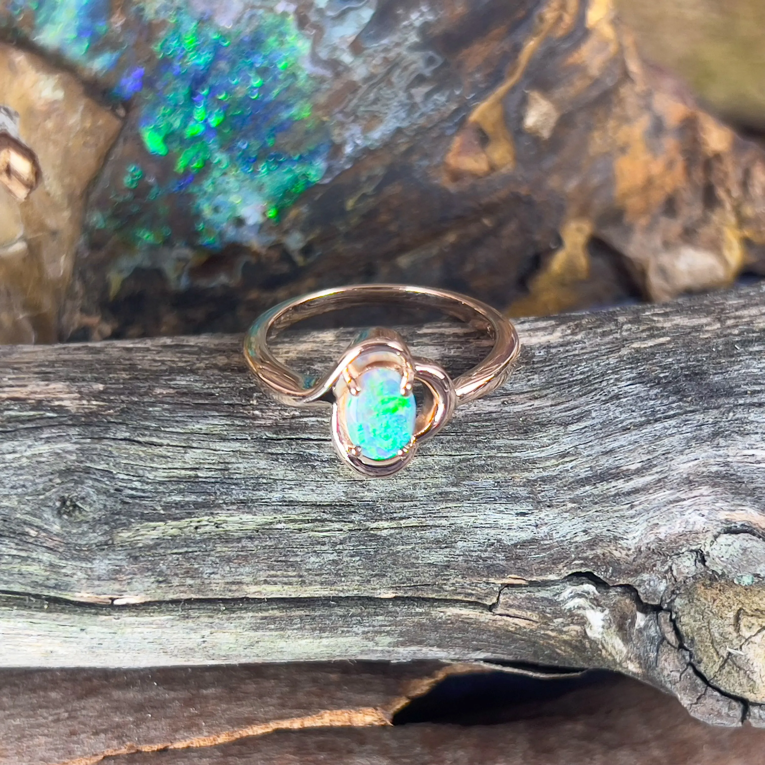 9kt Rose Gold solitaire ring with one Black Opal 0.47ct