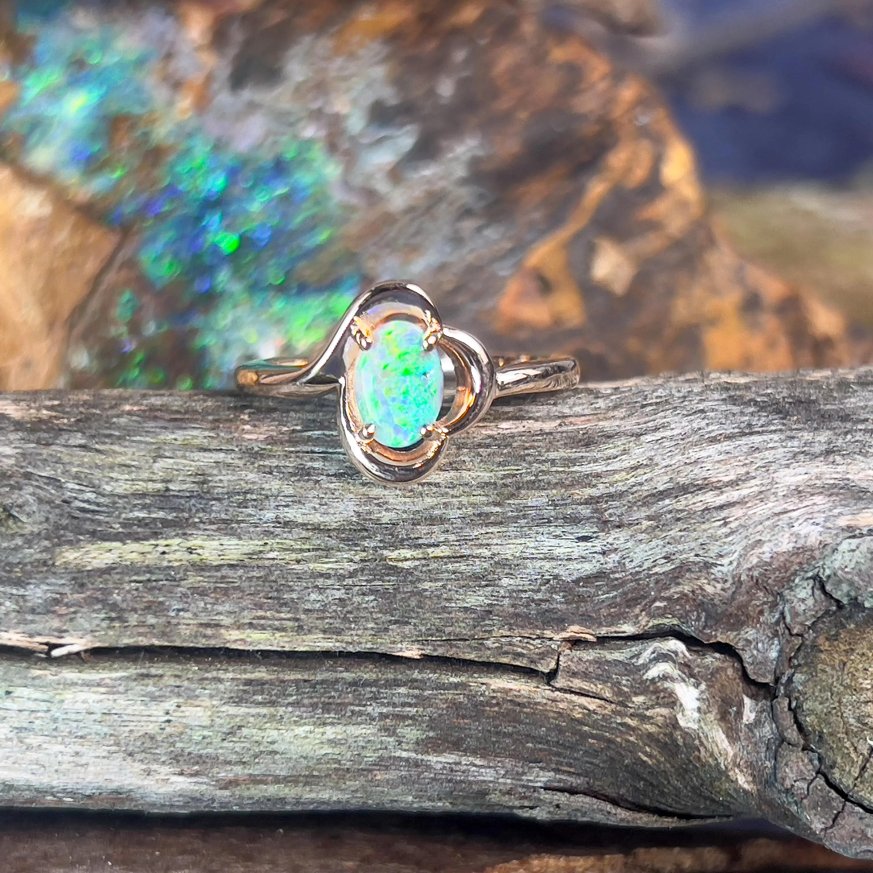 9kt Rose Gold solitaire ring with one Black Opal 0.47ct