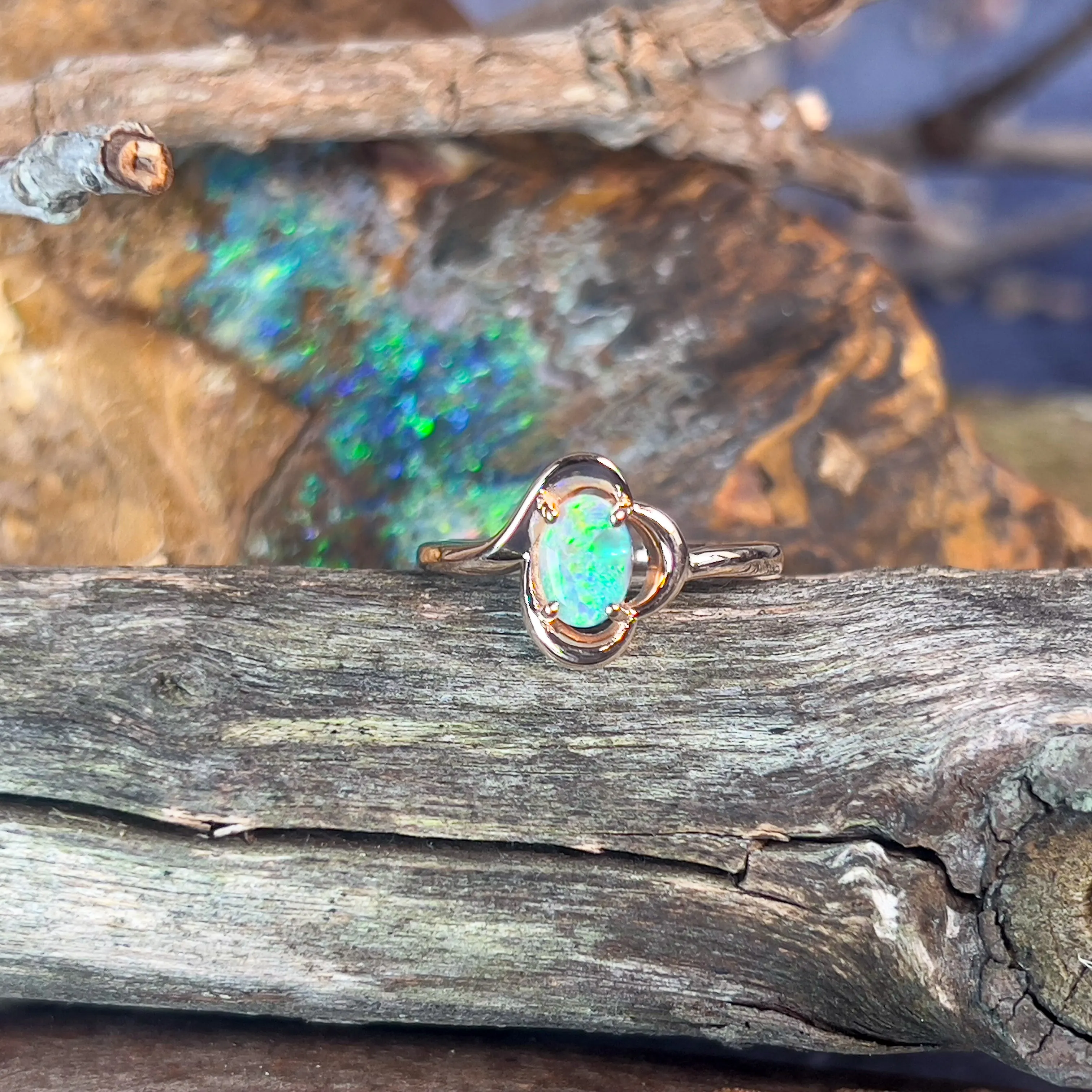 9kt Rose Gold solitaire ring with one Black Opal 0.47ct