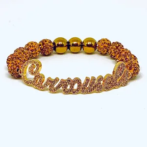 Gold Carrousels Script Bracelet