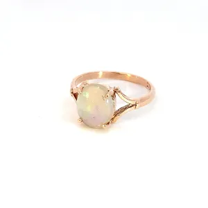 One 9kt Rose Gold solitaire ring set with one Green Blue Light Opal 1.49ct